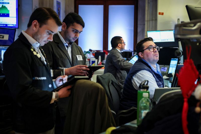 US stocks end higher as traders focus on tariffs, data